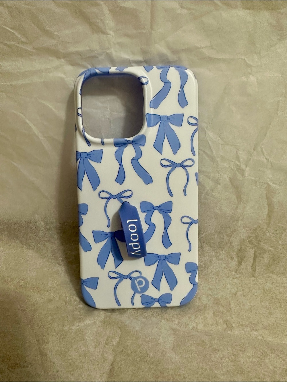 Loopy Case “Blue Bows” White iPhone Case with Blue Bow Pattern and Built-In Loop